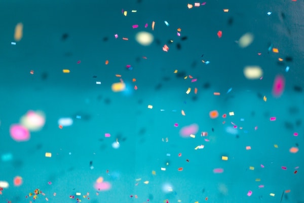 Party confetti in the air.